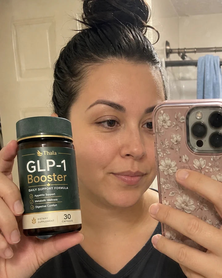 Thala customer holding the GLP-1 Booster