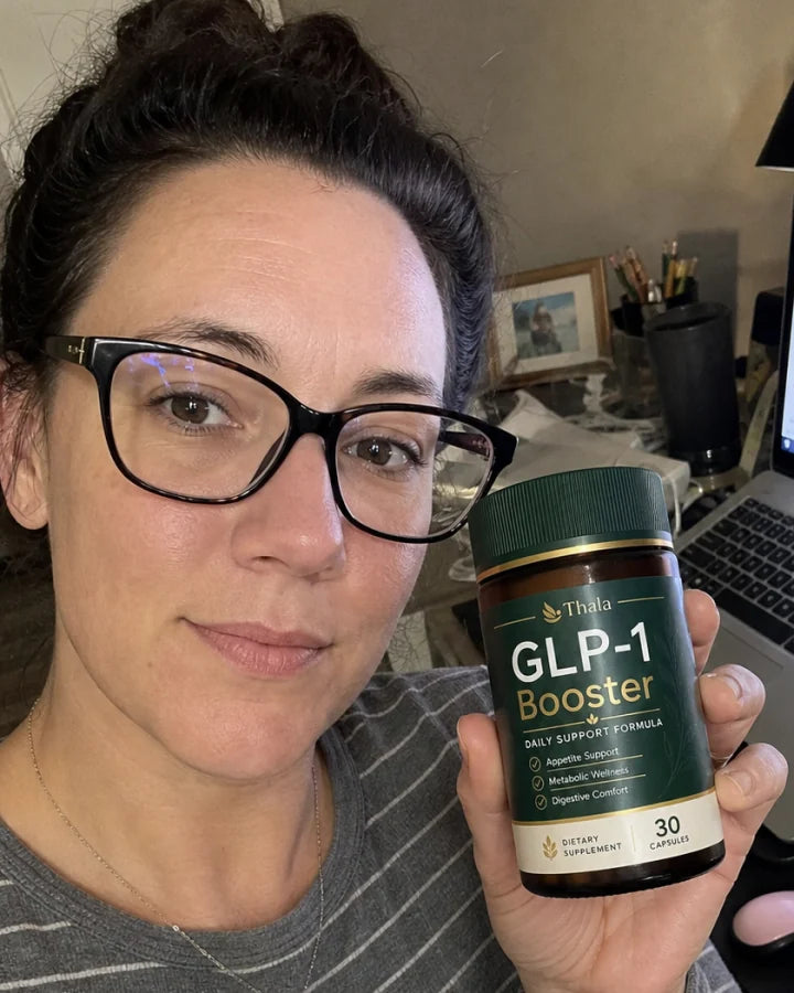 Thala customer holding the GLP-1 Booster